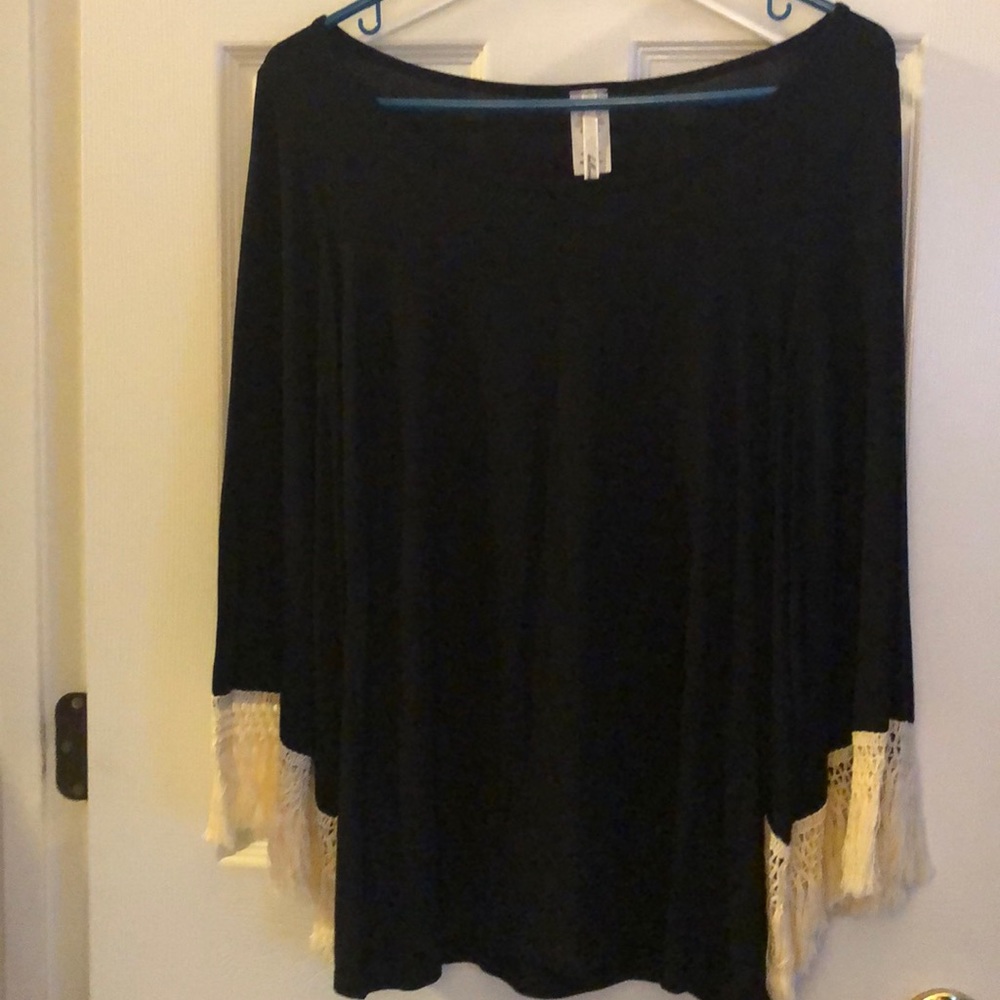 Long sleeve black and creme blouse